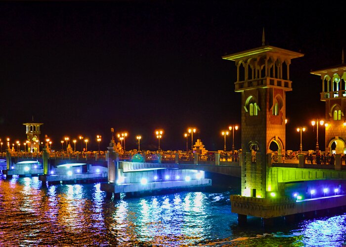 Private air-conditioned van driving along the Alexandria Corniche