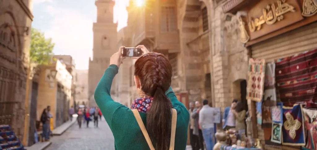 tourists walking in historic Cairo street