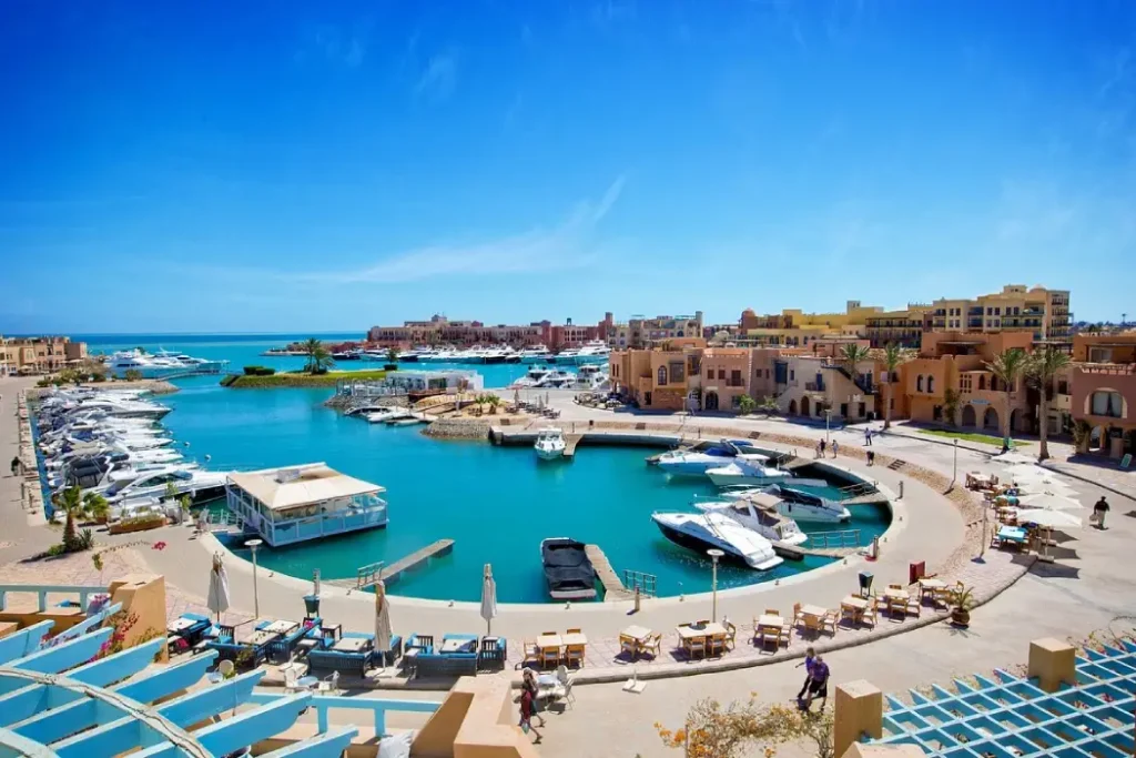 couple relaxing at the infinity pool of the luxury Red Sea resort, El Gouna